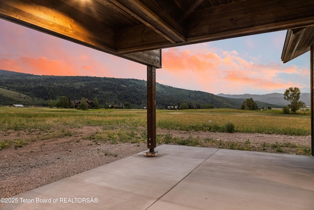555 Silver Fox Ln, Victor, ID 83455 - view of patio / terrace with a mountain view and a view of rural / pastoral area