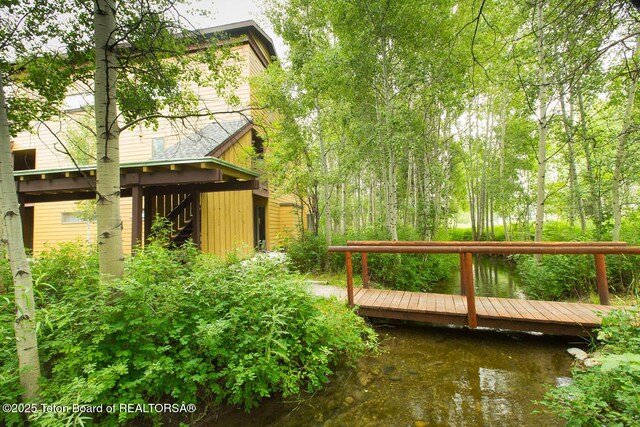 3885 S Lake Creek Dr Unit 1013, Wilson, WY 83014 - view of yard with a water view