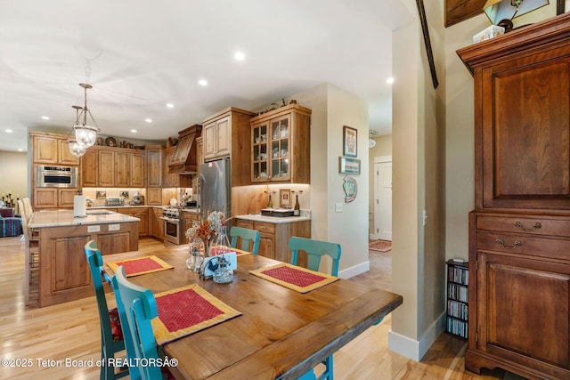 6289 Fox Meadows Dr, Victor, ID 83455 - dining space featuring recessed lighting and light wood-style floors