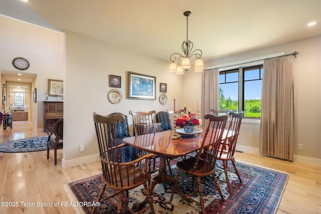 6289 Fox Meadows Dr, Victor, ID 83455 - dining space featuring plenty of natural light, light wood-style flooring, a chandelier, and recessed lighting