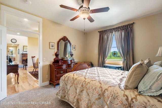 6289 Fox Meadows Dr, Victor, ID 83455 - carpeted bedroom with baseboards and a ceiling fan