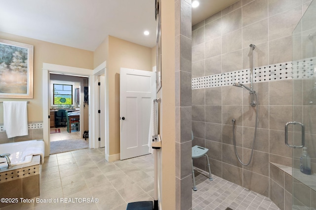 6289 Fox Meadows Dr, Victor, ID 83455 - full bathroom featuring a shower stall, tile patterned flooring, and recessed lighting