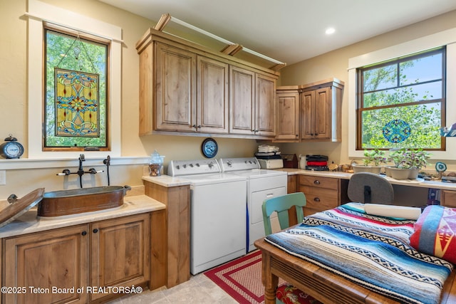 6289 Fox Meadows Dr, Victor, ID 83455 - laundry area featuring cabinet space, washer and clothes dryer, and recessed lighting