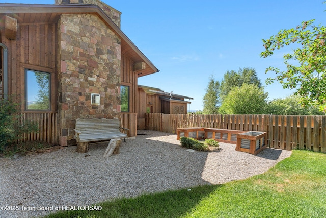 6289 Fox Meadows Dr, Victor, ID 83455 - view of yard with a patio