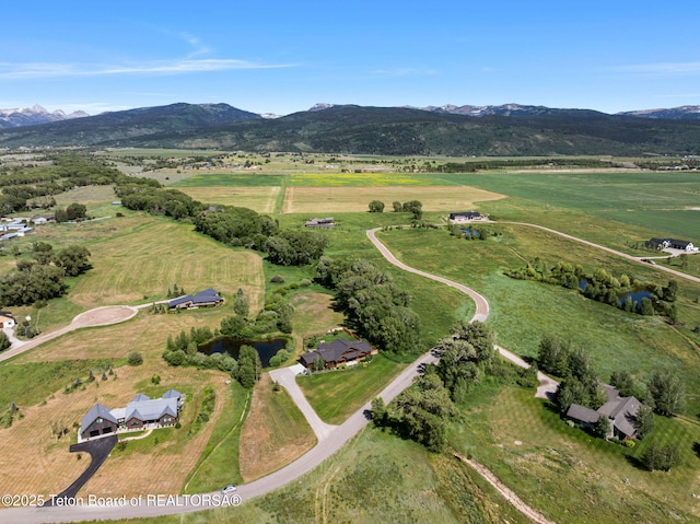 6289 Fox Meadows Dr, Victor, ID 83455 - aerial view of property and surrounding area with rural landscape and mountains
