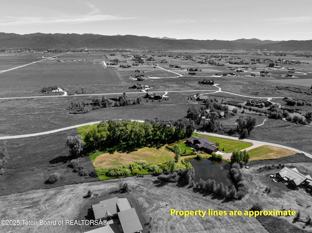 6289 Fox Meadows Dr, Victor, ID 83455 - aerial view of a mountain backdrop
