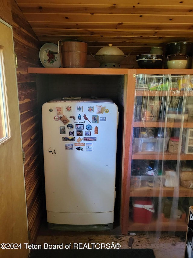 141 W 12250 N, Tetonia, ID 83452 - detailed view of freestanding refrigerator and wood walls