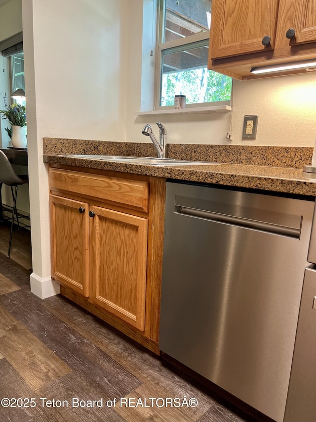 220 Homestead Rd Unit 203, Victor, ID 83455 - kitchen featuring dishwasher, dark wood finished floors, brown cabinetry, and baseboard heating