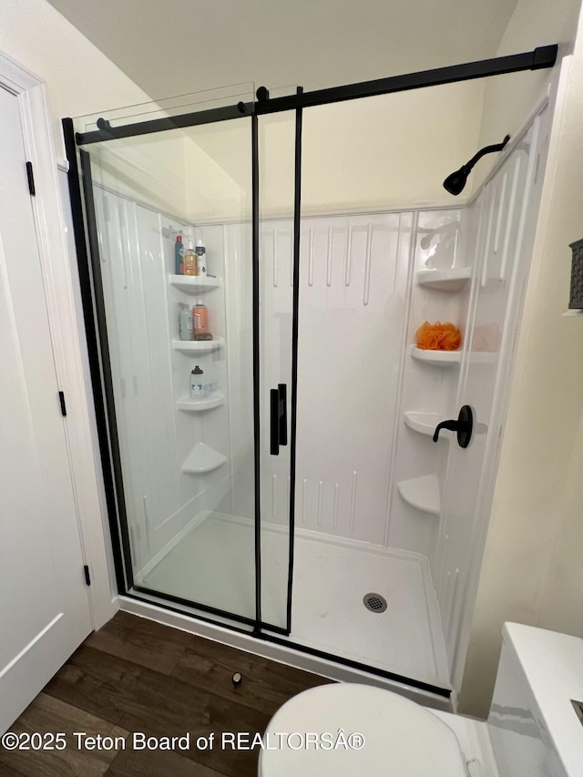 220 Homestead Rd Unit 203, Victor, ID 83455 - bathroom with wood finished floors and a shower stall