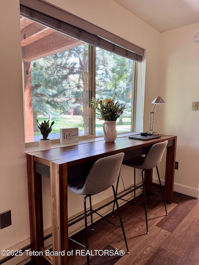 220 Homestead Rd Unit 203, Victor, ID 83455 - dining room featuring wood finished floors and an office area