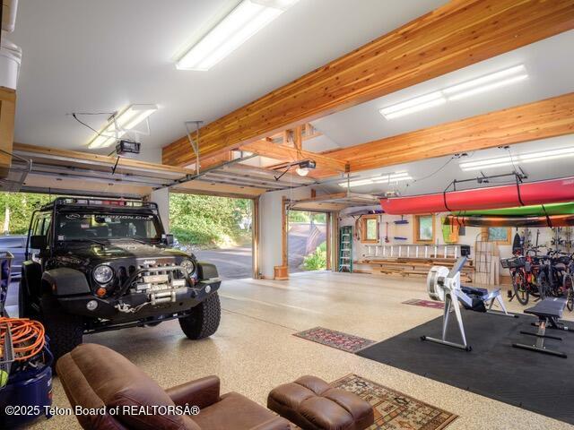 750 N Bar Y Rd, Jackson, WY 83001 - garage featuring a garage door opener