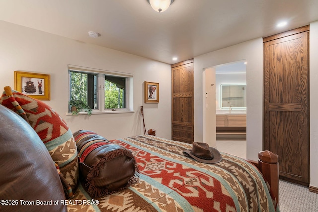 750 N Bar Y Rd, Jackson, WY 83001 - bedroom with carpet floors, recessed lighting, and ensuite bathroom