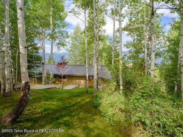 750 N Bar Y Rd, Jackson, WY 83001 - view of grassy yard featuring a mountain view