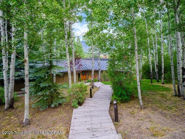 750 N Bar Y Rd, Jackson, WY 83001 - rear view of property featuring a standing seam roof and a metal roof