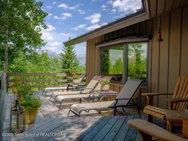 750 N Bar Y Rd, Jackson, WY 83001 - wooden deck featuring a mountain view