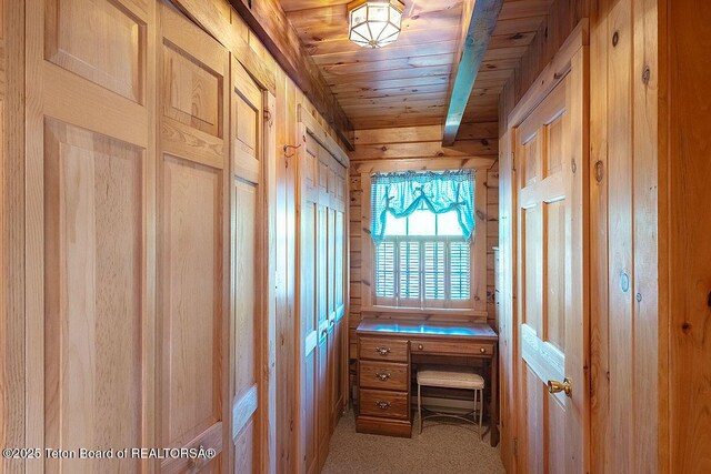 386 Dogwood Dr, Star Valley Ranch, WY 83127 - unfurnished office with wooden ceiling, wooden walls, and light colored carpet