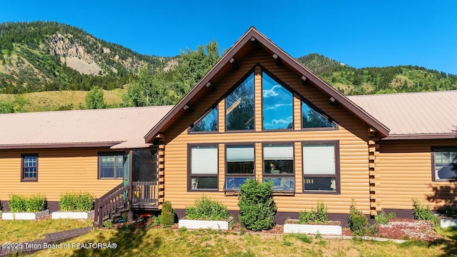 386 Dogwood Dr, Star Valley Ranch, WY 83127 - log-style house with log exterior, a mountain view, and a metal roof