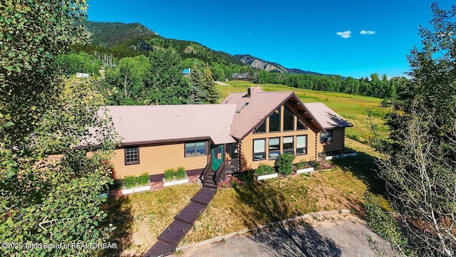 386 Dogwood Dr, Star Valley Ranch, WY 83127 - cabin featuring a mountain view, a metal roof, and log siding