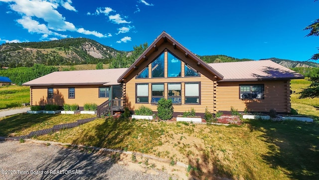 386 Dogwood Dr, Star Valley Ranch, WY 83127 - log cabin featuring log siding, a mountain view, and a front yard