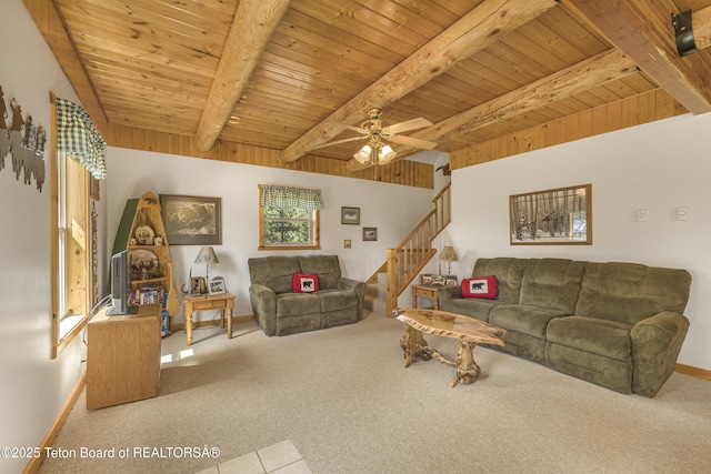 3320 Griffel Ct, Island Park, ID 83429 - carpeted living area featuring stairway, a wooden ceiling with exposed beams, and ceiling fan