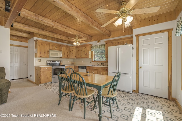 3320 Griffel Ct, Island Park, ID 83429 - dining room featuring a ceiling fan, a wooden ceiling with exposed beams, and light floors