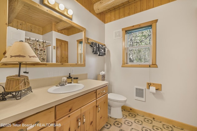 3320 Griffel Ct, Island Park, ID 83429 - full bathroom with vanity, wood ceiling, heating unit, and tile patterned floors
