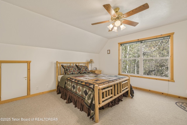 3320 Griffel Ct, Island Park, ID 83429 - bedroom with carpet, vaulted ceiling, and ceiling fan