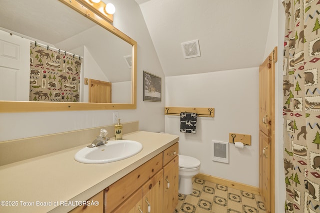 3320 Griffel Ct, Island Park, ID 83429 - bathroom featuring vanity, lofted ceiling, curtained shower, heating unit, and tile patterned floors