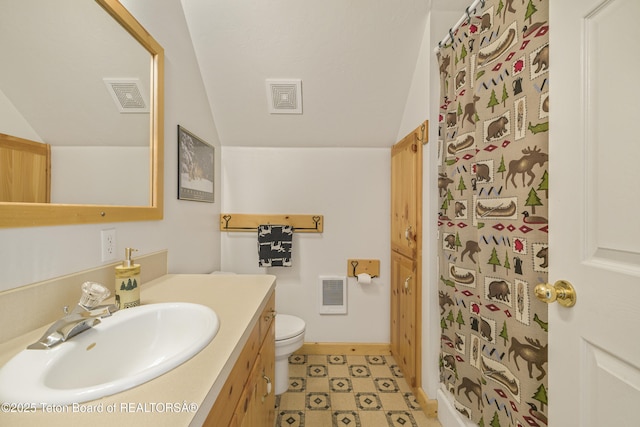3320 Griffel Ct, Island Park, ID 83429 - full bath featuring vaulted ceiling, vanity, and heating unit