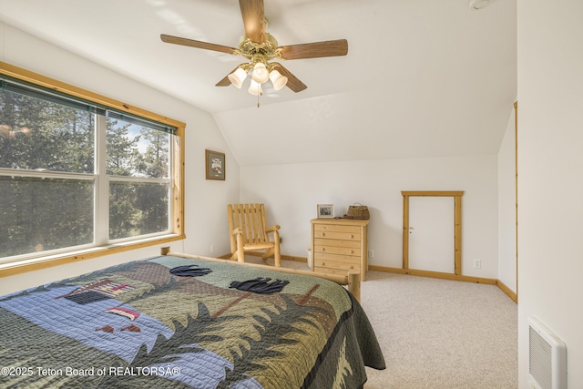 3320 Griffel Ct, Island Park, ID 83429 - bedroom featuring vaulted ceiling, carpet floors, a ceiling fan, and heating unit