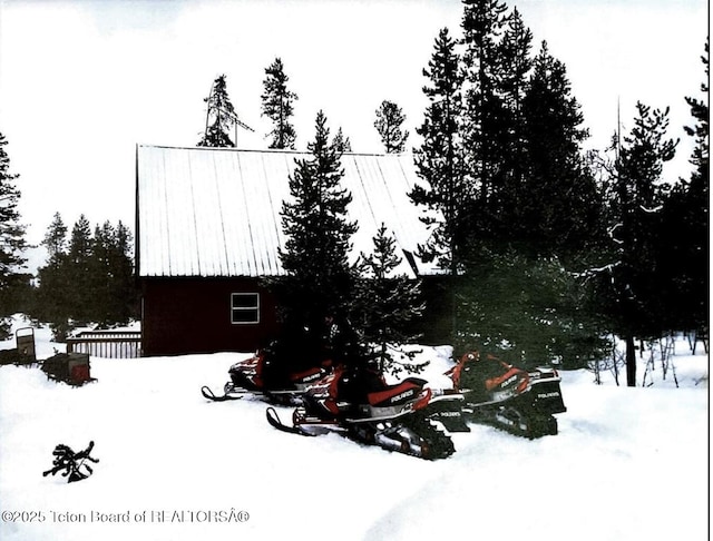 3320 Griffel Ct, Island Park, ID 83429 - snow covered property