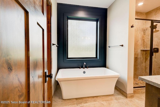 245 Pond Dr, Victor, ID 83455 - full bath with a freestanding tub and a stall shower