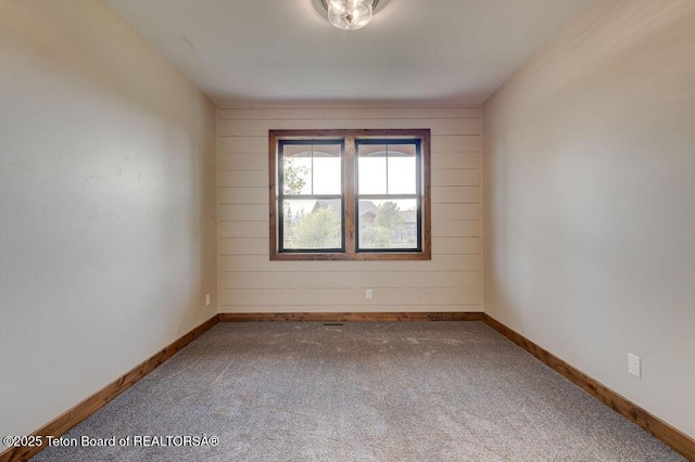 245 Pond Dr, Victor, ID 83455 - carpeted empty room with baseboards
