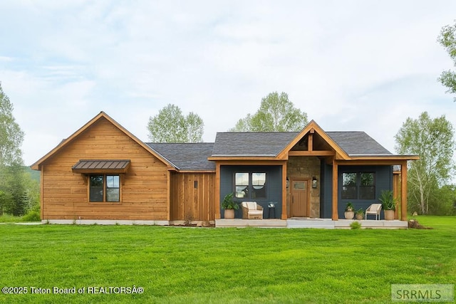 245 Pond Dr, Victor, ID 83455 - view of front of property with a front lawn and a porch