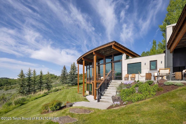 1955 W Bohnetts Rd, Jackson, WY 83001 - view of front of house with a front lawn
