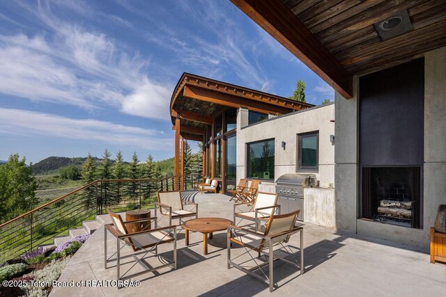 1955 W Bohnetts Rd, Jackson, WY 83001 - view of patio with exterior kitchen