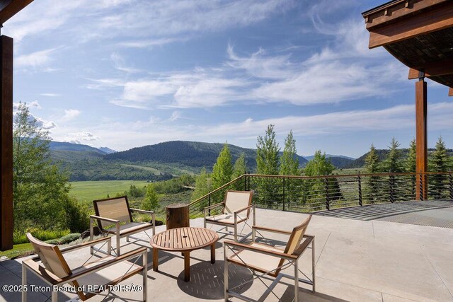 1955 W Bohnetts Rd, Jackson, WY 83001 - view of patio / terrace with a mountain view