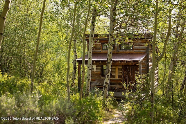 1955 W Bohnetts Rd, Jackson, WY 83001 - view of outdoor structure featuring a forest view