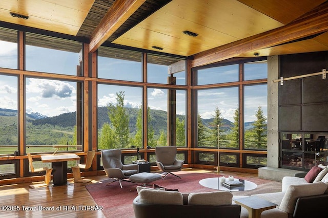 1955 W Bohnetts Rd, Jackson, WY 83001 - sunroom / solarium with a mountain view and beam ceiling