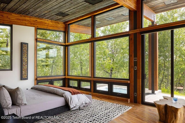 1955 W Bohnetts Rd, Jackson, WY 83001 - bedroom with wood finished floors and wooden ceiling