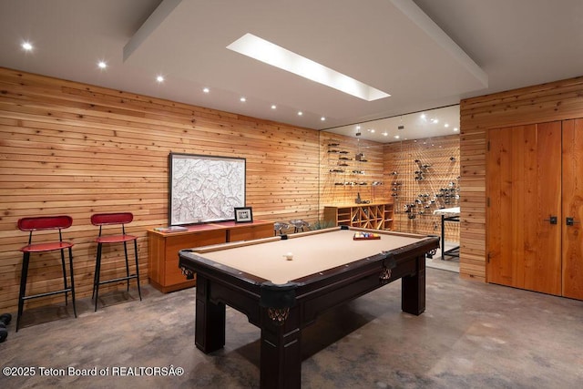 1955 W Bohnetts Rd, Jackson, WY 83001 - playroom with finished concrete floors, recessed lighting, billiards table, and wooden walls