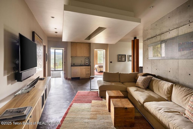1955 W Bohnetts Rd, Jackson, WY 83001 - living room featuring concrete flooring