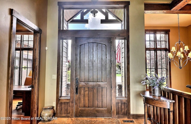 70 Hastings Dr, Victor, ID 83455 - entryway with a chandelier and baseboards