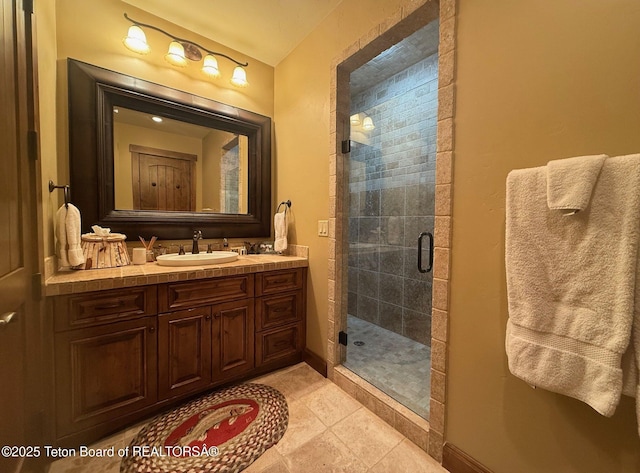 70 Hastings Dr, Victor, ID 83455 - bathroom featuring vanity, a stall shower, and tile patterned flooring