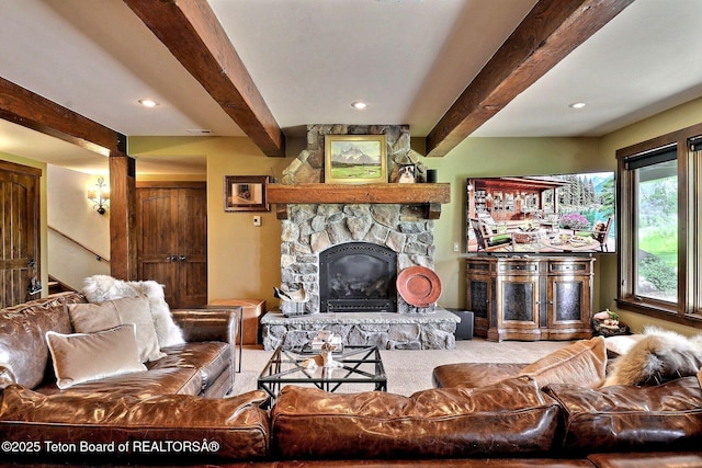 70 Hastings Dr, Victor, ID 83455 - living area featuring beam ceiling, a stone fireplace, and recessed lighting