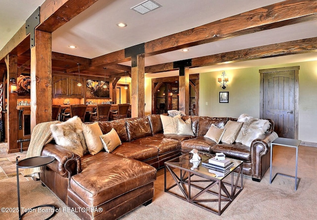 70 Hastings Dr, Victor, ID 83455 - living area featuring beam ceiling, recessed lighting, and light colored carpet