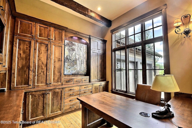 70 Hastings Dr, Victor, ID 83455 - office area featuring beam ceiling, plenty of natural light, and light wood-style floors