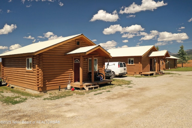4760 W 500 W, Victor, ID 83455 - log home with log exterior and a metal roof