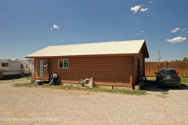 4760 W 500 W, Victor, ID 83455 - view of property exterior with log siding and a metal roof