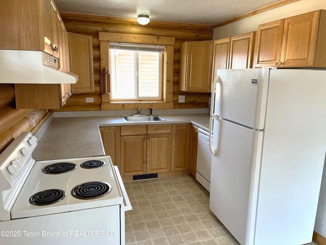 4760 W 500 W, Victor, ID 83455 - kitchen with white appliances, under cabinet range hood, rustic walls, and light countertops